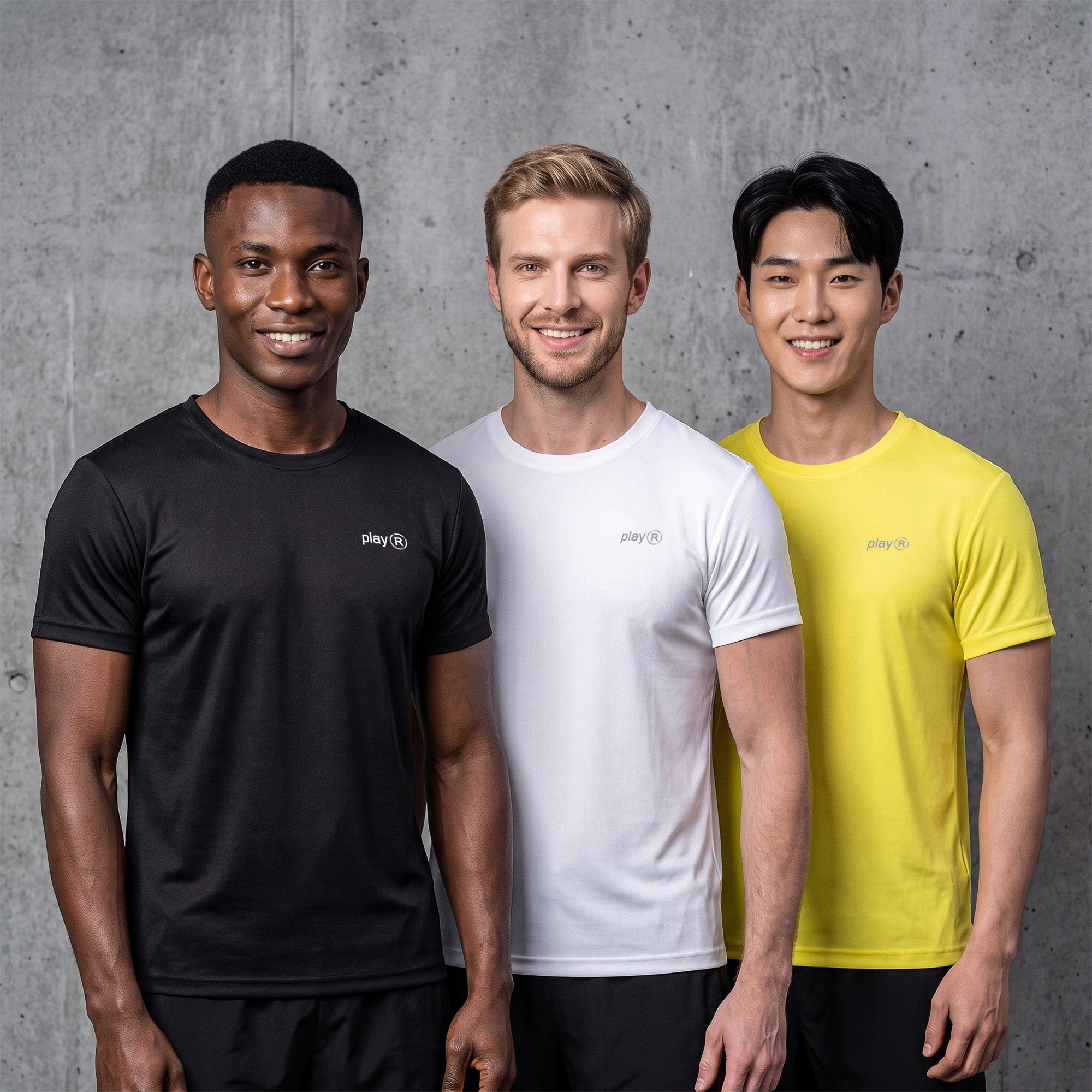 Three men standing side by side wearing matching short-sleeve athletic t-shirts in black, white, and yellow, each with a small white 'playR' logo on the left chest, set against a textured gray concrete wall.